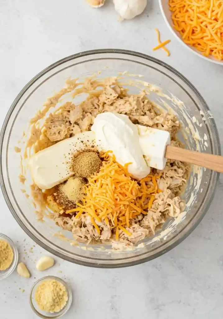 Mixing Chicken and Cream Cheese for Crescent Rolls