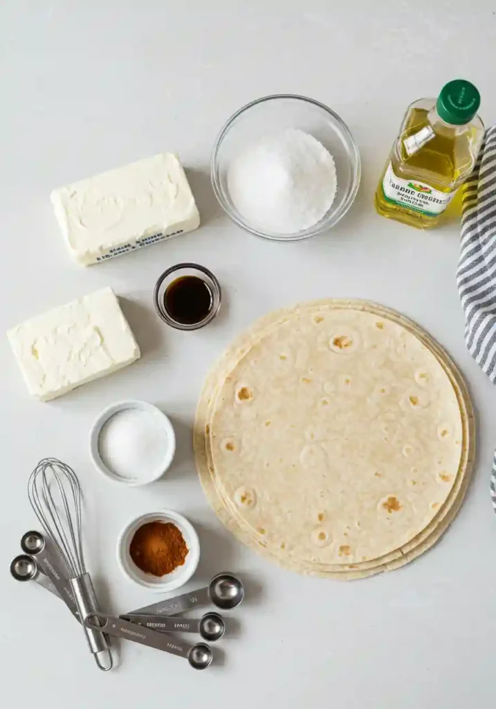 Cream cheese, sugar, tortillas, and cinnamon laid out for xango recipe