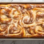 Slice of Cinnamon Roll Coffee Cake with Glaze