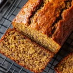 Freshly baked gluten free banana bread on a cutting board