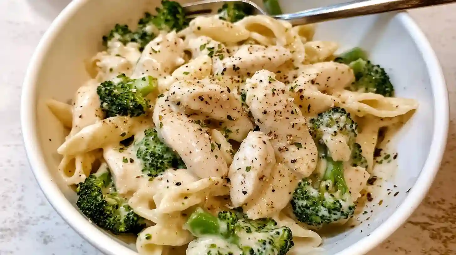 Plated Chicken Broccoli Alfredo with Penne