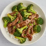 Finished Beef and Broccoli in a White Bowl