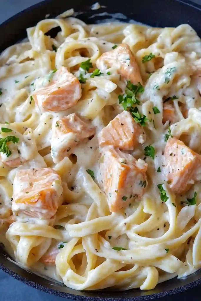 Tossing Salmon with Alfredo and Fettuccine