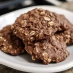 Stack of no bake chocolate oatmeal cookies on a plate