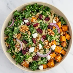 Final kale quinoa salad served with lemon wedges