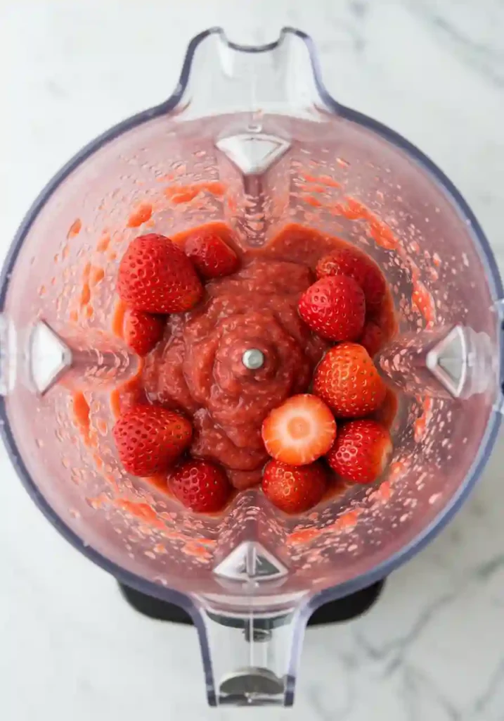 Blender with Fresh Strawberries Ready to Make Puree